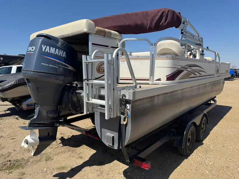 Slide: The Image of 2008 G3 SunCatcher 228 F&C Vinyl pontoon boat with Yamaha motor on trailer. - 3