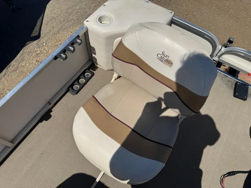 Slide: The Image of 2008 G3 SunCatcher 228 F&C Vinyl boat seat with cup holder and shadow. - 8