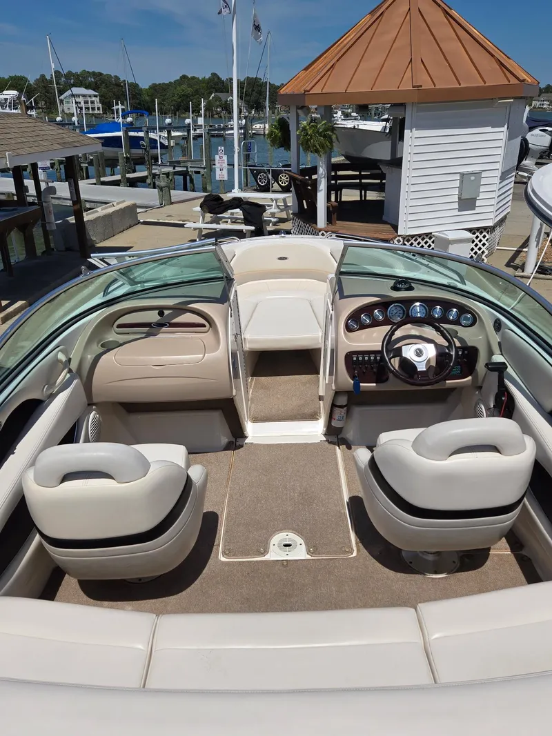 Slide: The Image of Interior view of a 2000 Chaparral 196 SSi boat at a marina. - 3