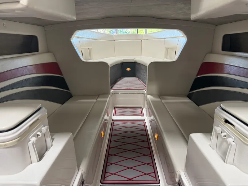 Slide: The Image of Interior of a 2006 Sleekcraft Heritage boat, featuring elegant seating and modern design. - 39