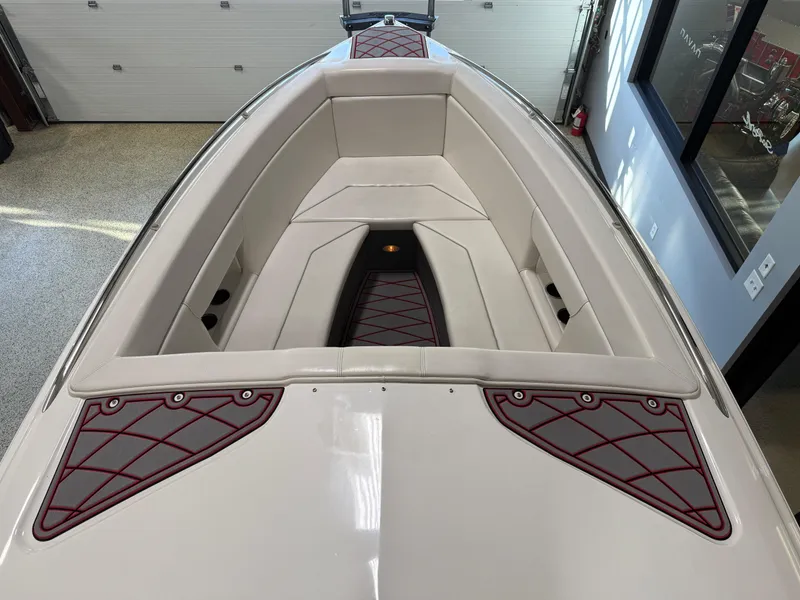 Slide: The Image of 2006 Sleekcraft Heritage boat interior with beige seating and red accents. - 42