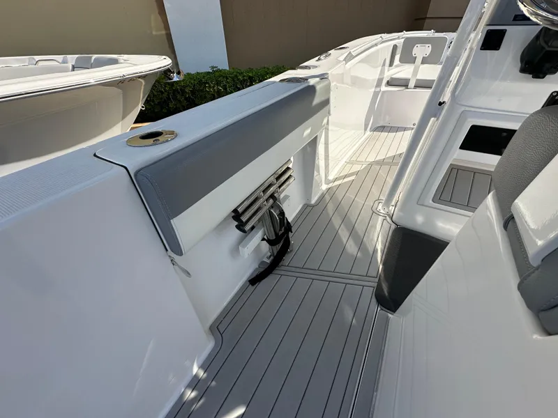 Slide: The Image of 2021 Release 240 RX boat interior with sleek seating and modern design. - 12