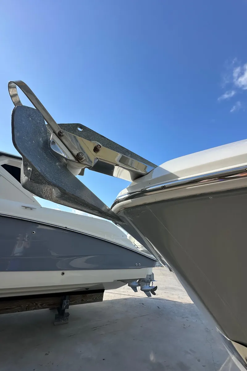 Slide: The Image of 2021 Release 240 RX boat anchor detail against clear blue sky. - 3