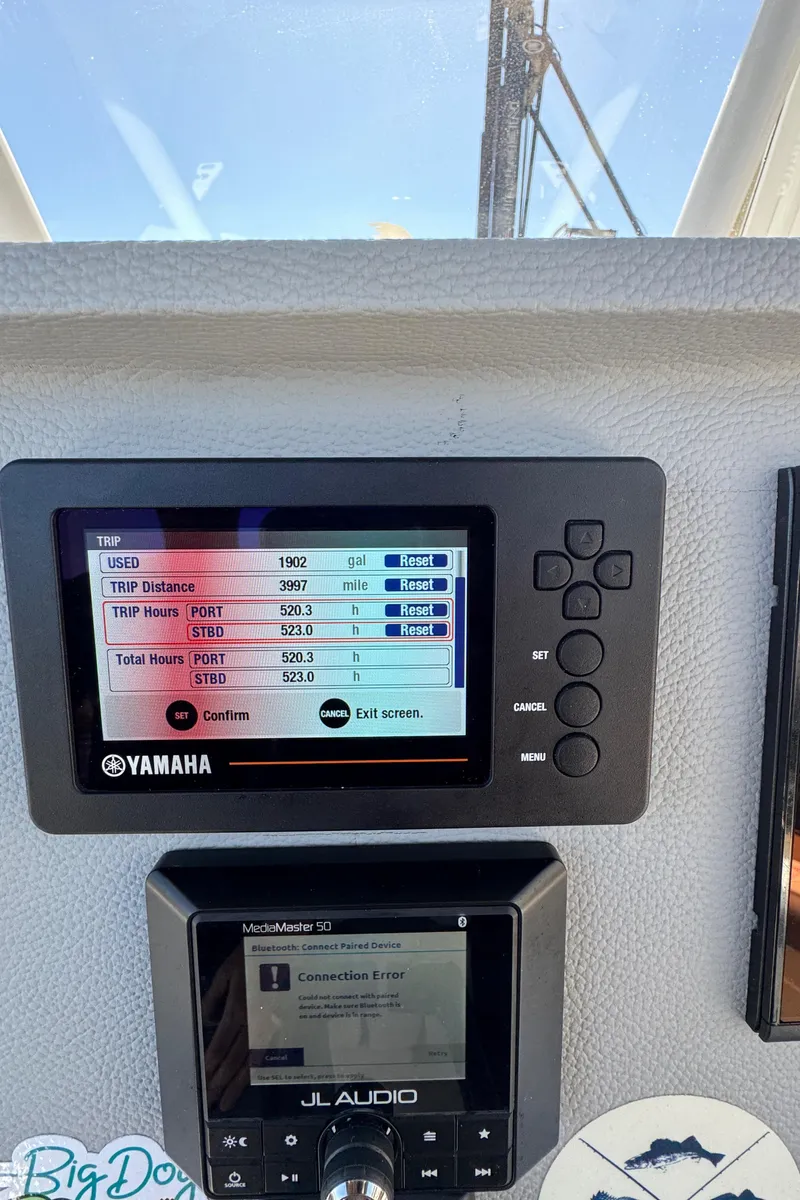 Slide: The Image of Yamaha marine display and JL Audio system on 2021 Release 240 RX boat dashboard. - 44
