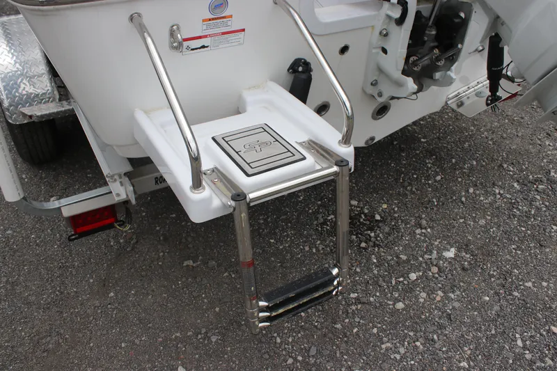 Slide: The Image of 2025 Sea Pro 202 CC boat ladder and platform on gravel surface. - 10