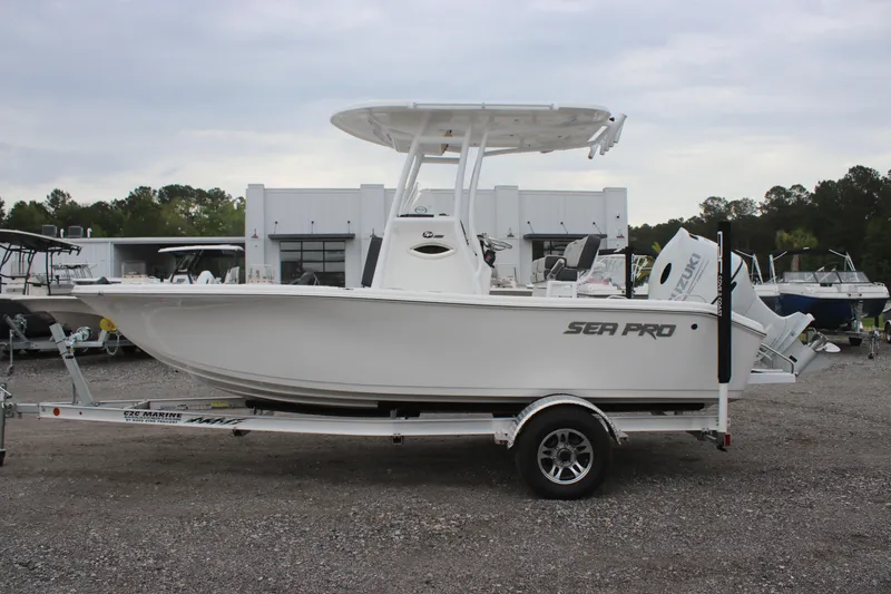Slide: The Image of 2025 Sea Pro 202 CC boat on trailer, displayed outdoors. - 4