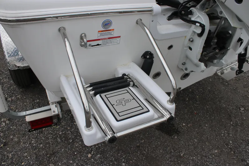 Slide: The Image of 2025 Sea Pro 202 CC boat ladder and platform detail, featuring stainless steel rails. - 6