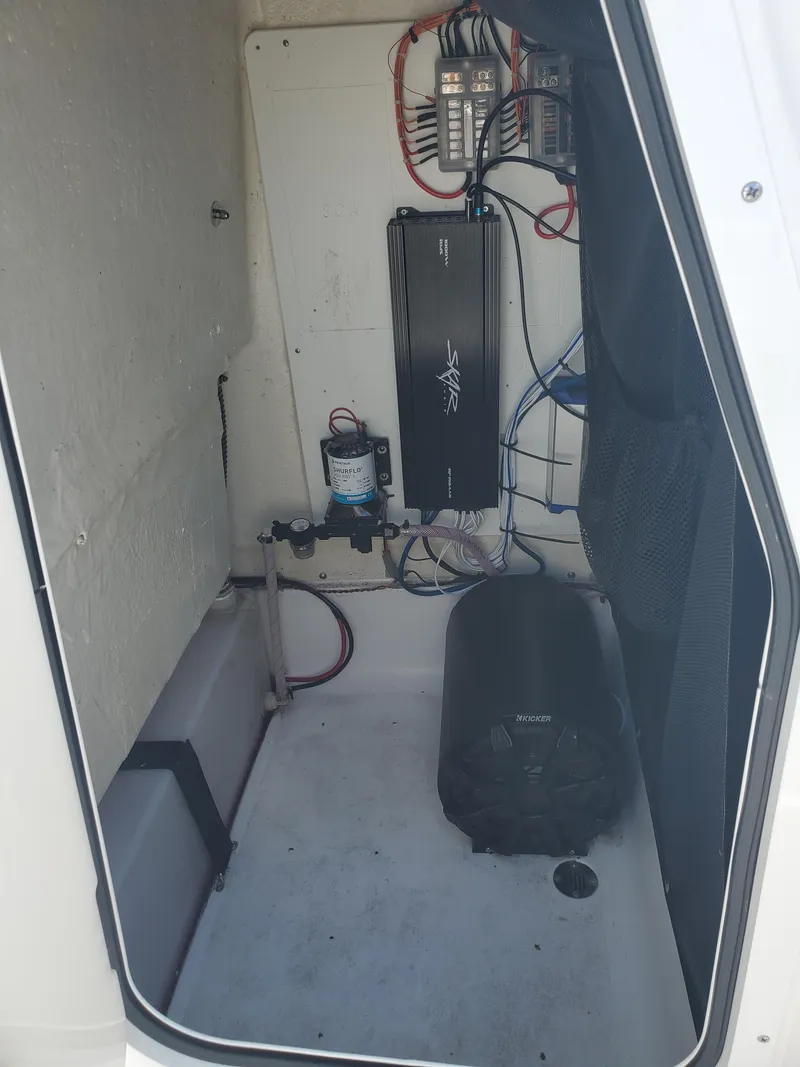 Slide: The Image of 2022 Sportsman Open 212 Center Console interior wiring and equipment setup. - 7