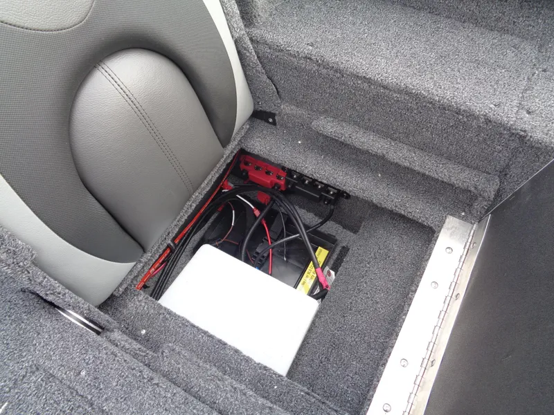 Slide: The Image of 2025 Lund 1775 Adventure SS boat interior showing battery compartment and wiring. - 18