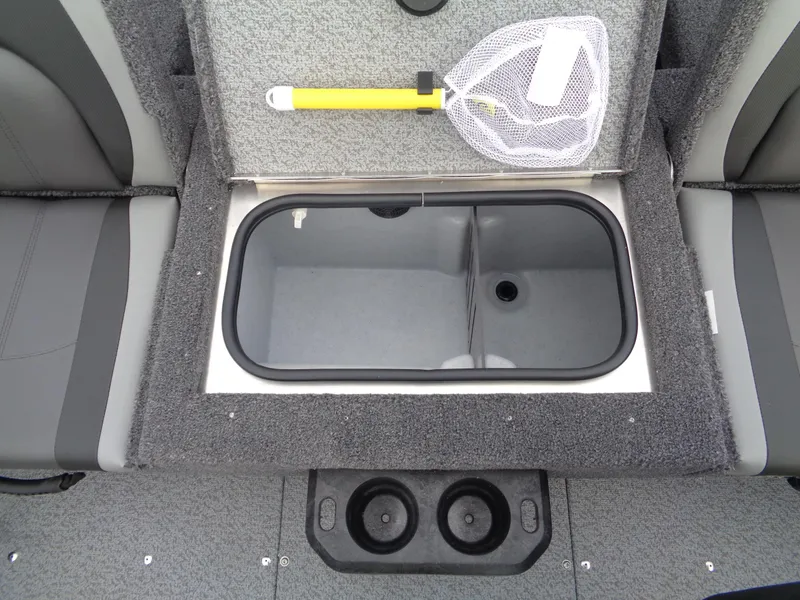 Slide: The Image of 2025 Lund 1775 Adventure SS boat interior with storage compartment and fishing net. - 3