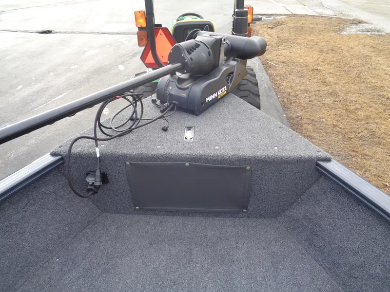 Slide: The Image of 2025 Lund 1775 Adventure SS boat with Minn Kota trolling motor on a trailer. - 34