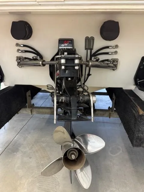 Slide: The Image of Rear view of a 2000 Fountain 27 Fever boat showing propeller and drive system. - 13