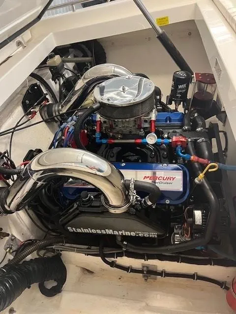 Slide: The Image of Engine of a 2000 Fountain 27 Fever boat with Mercury components and stainless steel exhaust. - 16