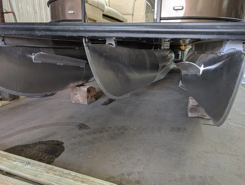 Slide: The Image of 2018 Sylvan Mirage Cruise 8524 Entertainer pontoon boat underside view. - 15