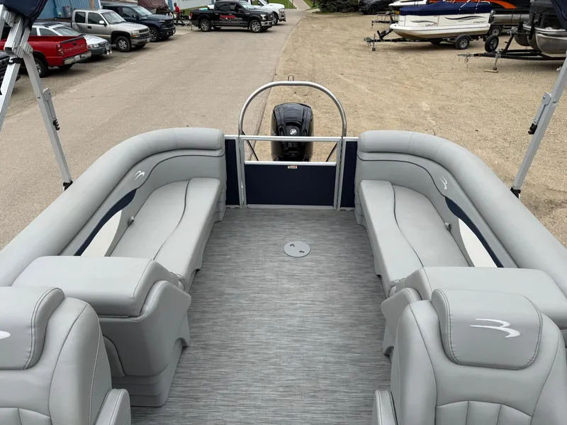 Slide: The Image of 2021 Bennington 22 SSR pontoon boat with spacious seating and modern design. - 18