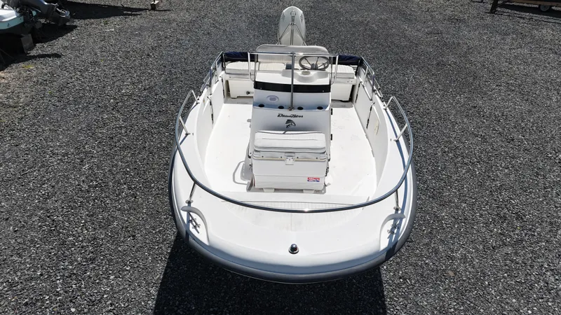 Slide: The Image of 2001 Boston Whaler DAUNTLESS boat on gravel, top view. - 10
