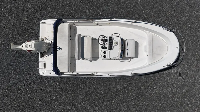 Slide: The Image of 2001 Boston Whaler DAUNTLESS boat, aerial view, on calm water. - 6