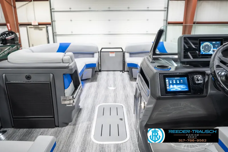 Slide: The Image of 2025 Bennington 24 MSB boat interior with modern dashboard and seating. - 20
