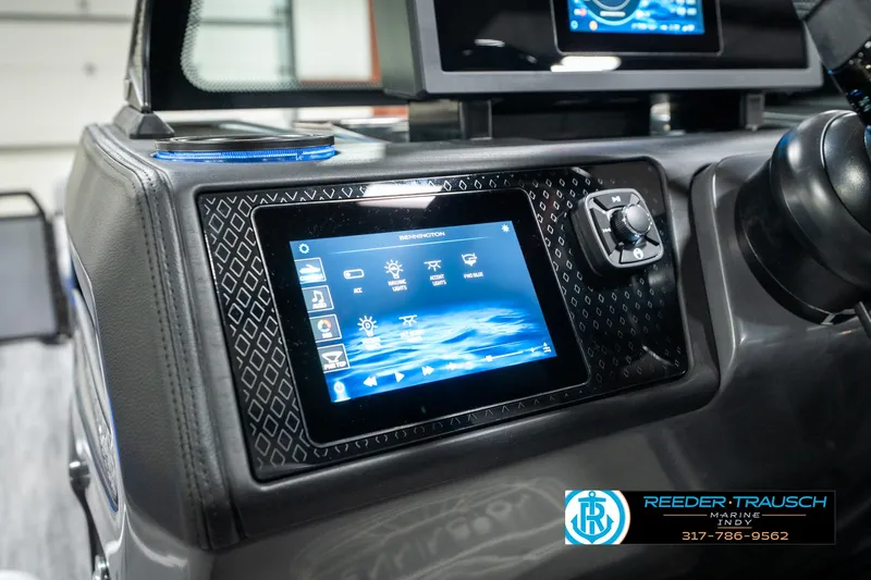 Slide: The Image of Dashboard of a 2025 Bennington 24 MSB boat with touchscreen controls. - 37