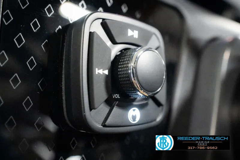 Slide: The Image of 2025 Bennington 24 MSB audio control knob with volume and track buttons. - 38