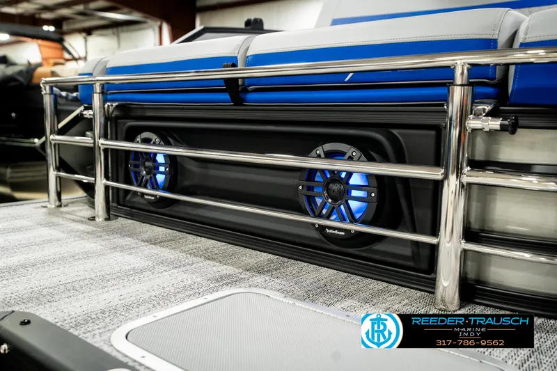 Slide: The Image of 2025 Bennington 24 MSB boat with illuminated speakers and sleek railing design. - 47