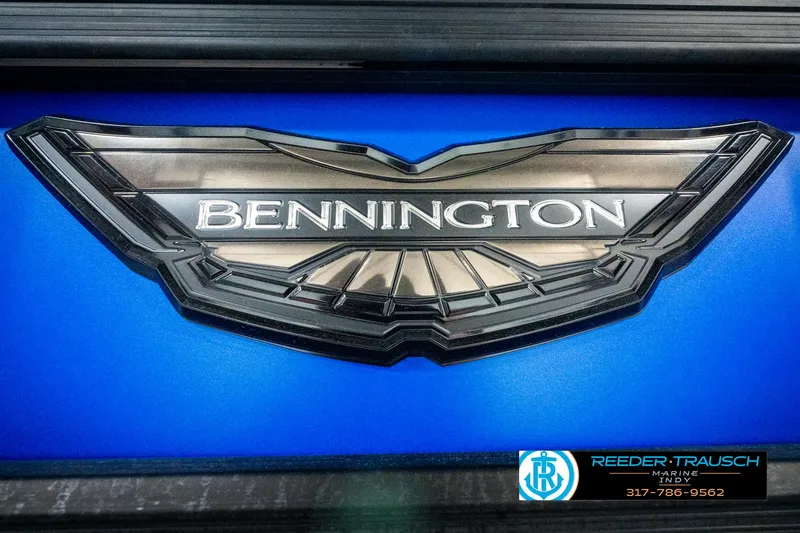 Slide: The Image of 2025 Bennington 24 MSB logo on a blue background, featuring Reeder-Trausch Marine branding. - 49