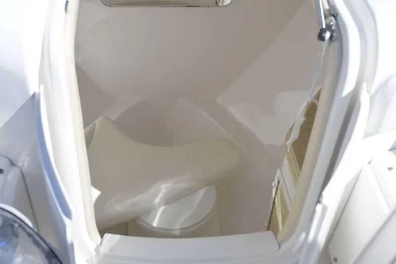 Slide: The Image of Interior cabin of 2010 Deep Impact 36 TE boat, featuring seating and storage. - 19