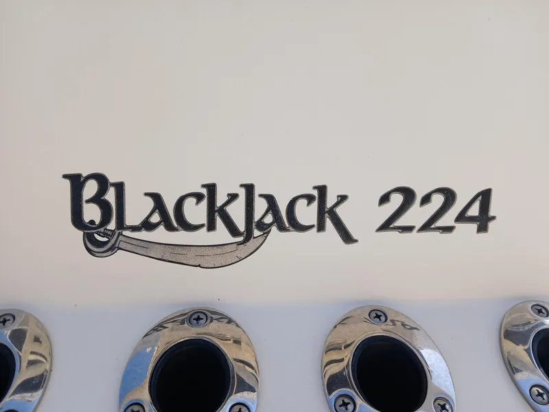 Slide: The Image of BlackJack 224 boat logo with chrome fittings, 2013 model. - 12