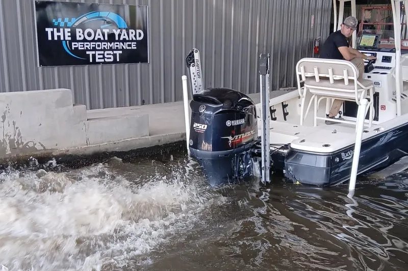 Slide: The Image of 2013 BlackJack 224 boat undergoing performance test at The Boat Yard, featuring Yamaha 250 engine. - 16
