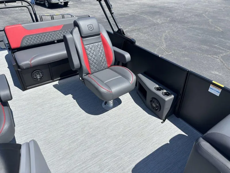 Slide: The Image of 2025 Godfrey SWEETWATER 2286 SFL boat interior with stylish seating and modern design. - 11