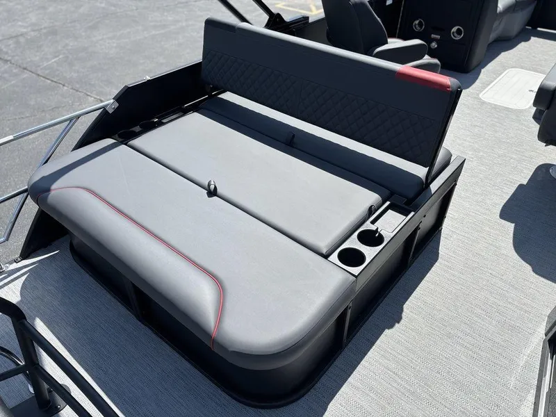 Slide: The Image of 2025 Godfrey SWEETWATER 2286 SFL boat seating with cup holders and sleek design. - 22