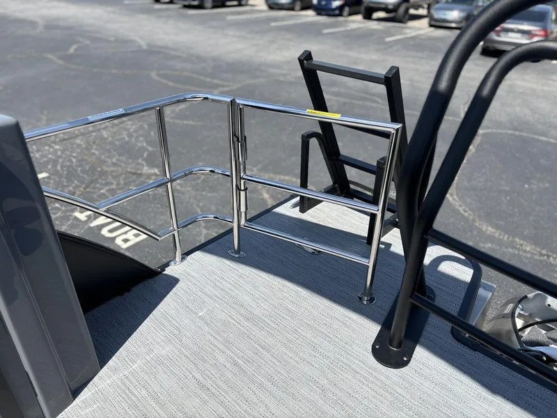 Slide: The Image of 2025 Godfrey SWEETWATER 2286 SFL boat deck with stainless steel railing and ladder. - 26