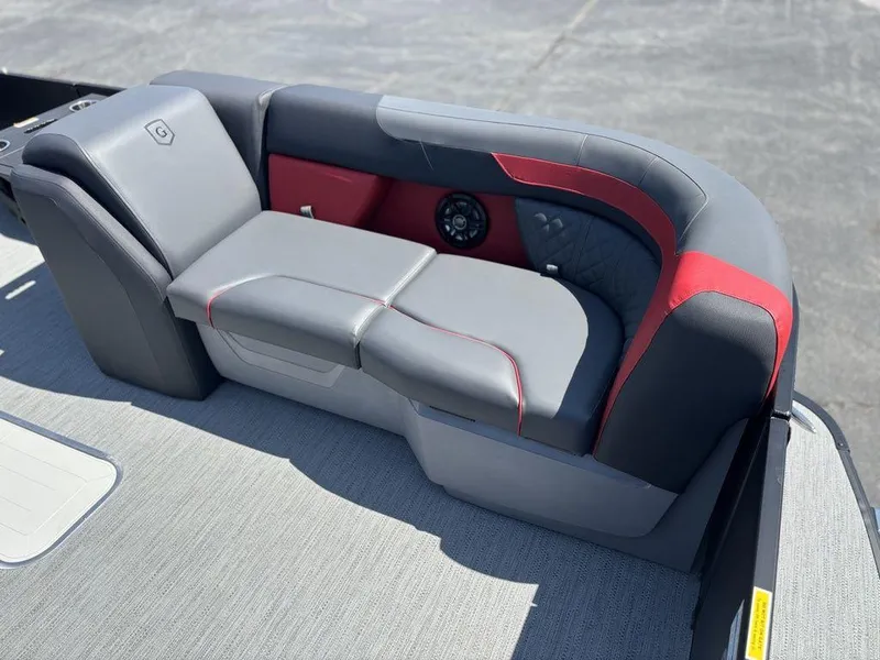 Slide: The Image of 2025 Godfrey SWEETWATER 2286 SFL boat seating with gray and red upholstery. - 9