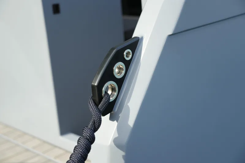 Slide: The Image of Rope cleat on Jaktar J30 Black Vision 2026 boat, showcasing sleek design and functionality. - 13