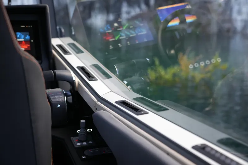 Slide: The Image of Interior view of 2026 Jaktar J30 Black Vision, showcasing dashboard and controls. - 22