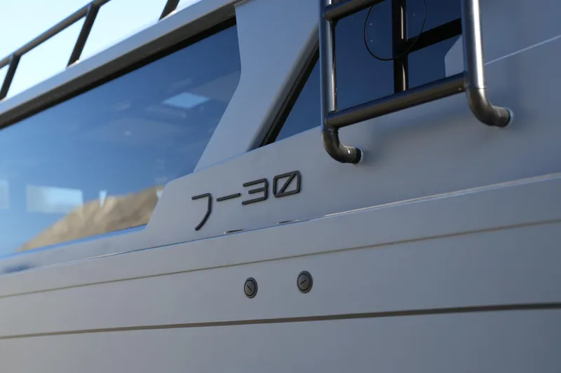 Slide: The Image of 2026 Jaktar J30 Black Vision boat exterior with sleek design and modern features. - 23