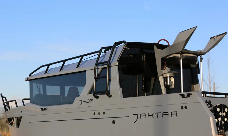 Slide: The Image of 2026 Jaktar J30 Black Vision boat with sleek design and modern features. - 3