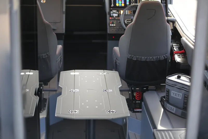Slide: The Image of Interior of 2026 Jaktar J30 Black Vision with modern seating and control panel. - 33