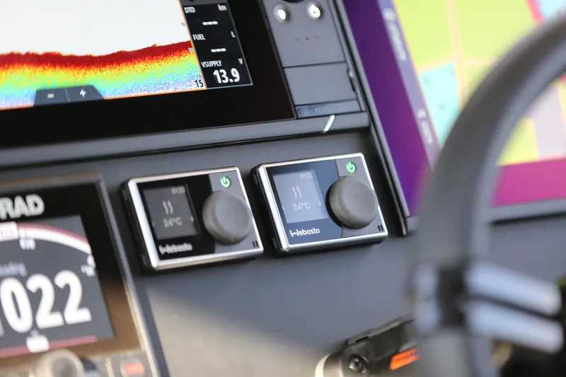 Slide: The Image of Control panel of Jaktar J30 Black Vision 2026 with digital displays and navigation instruments. - 36