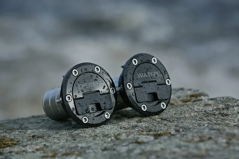 Slide: The Image of Fuel and water caps on rugged surface, Jaktar J30 Black Vision 2026. - 42