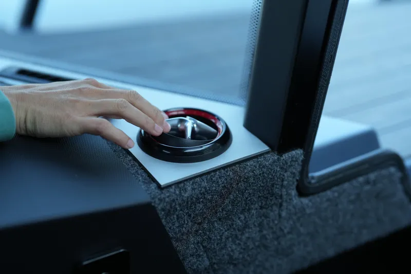 Slide: The Image of Hand adjusting speaker in 2026 Jaktar J30 Black Vision interior. - 49