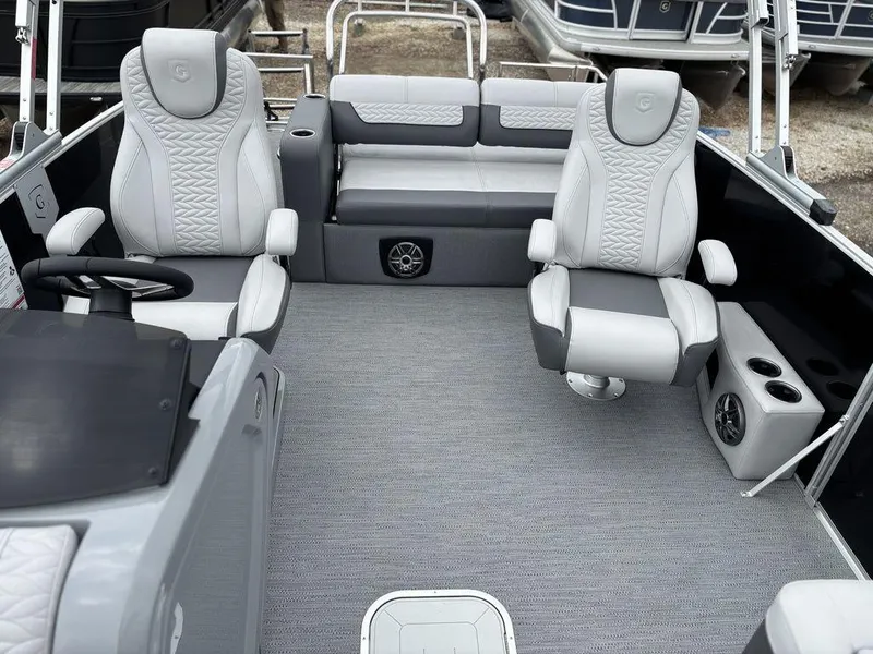 Slide: The Image of 2025 Godfrey Monaco 235 DFL boat interior with luxurious seating and modern design. - 12