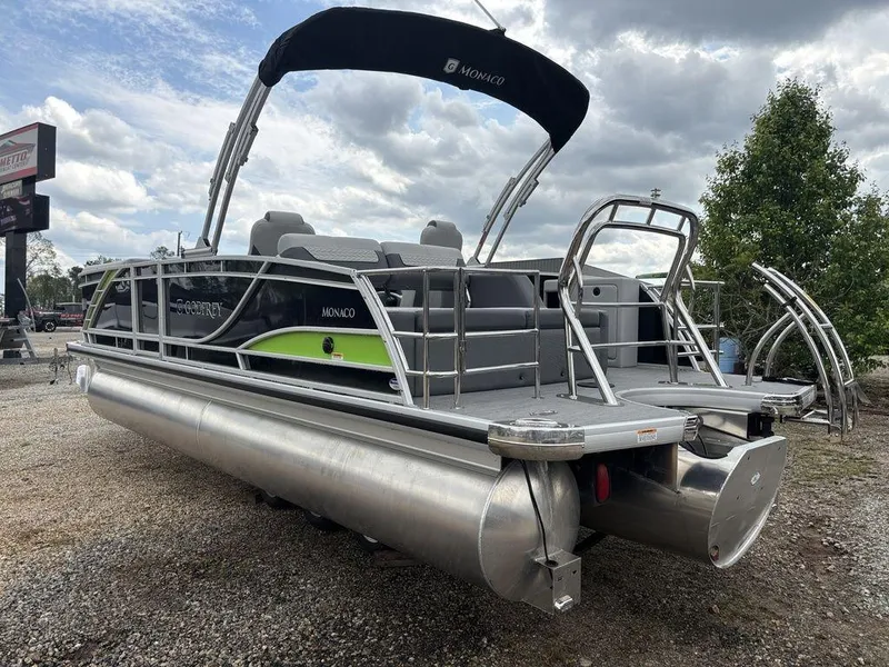 Slide: The Image of 2025 Godfrey Monaco 235 DFL pontoon boat with sleek design and modern features. - 3