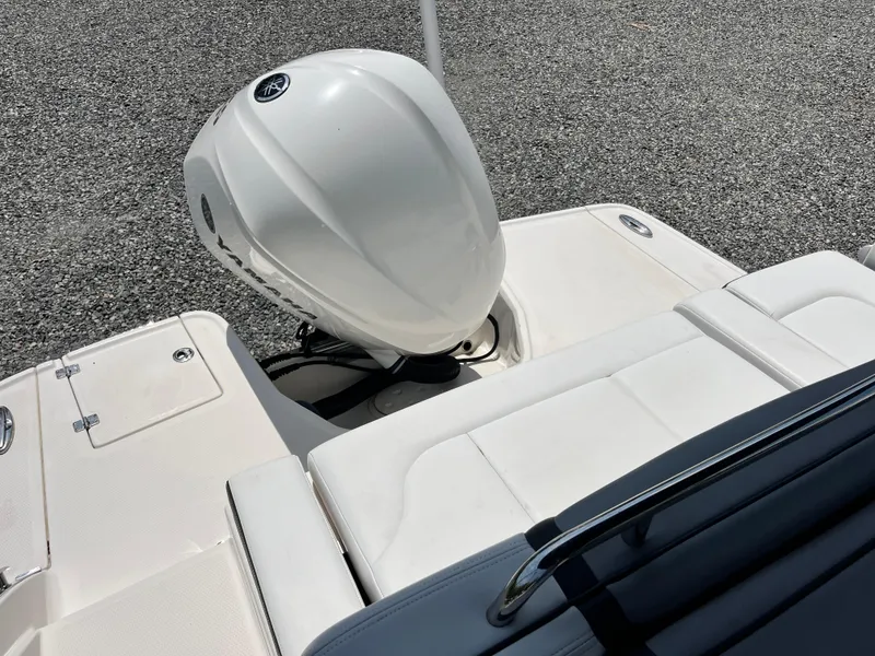 Slide: The Image of 2020 Chaparral 257 SSX boat with outboard motor on a sunny day. - 17