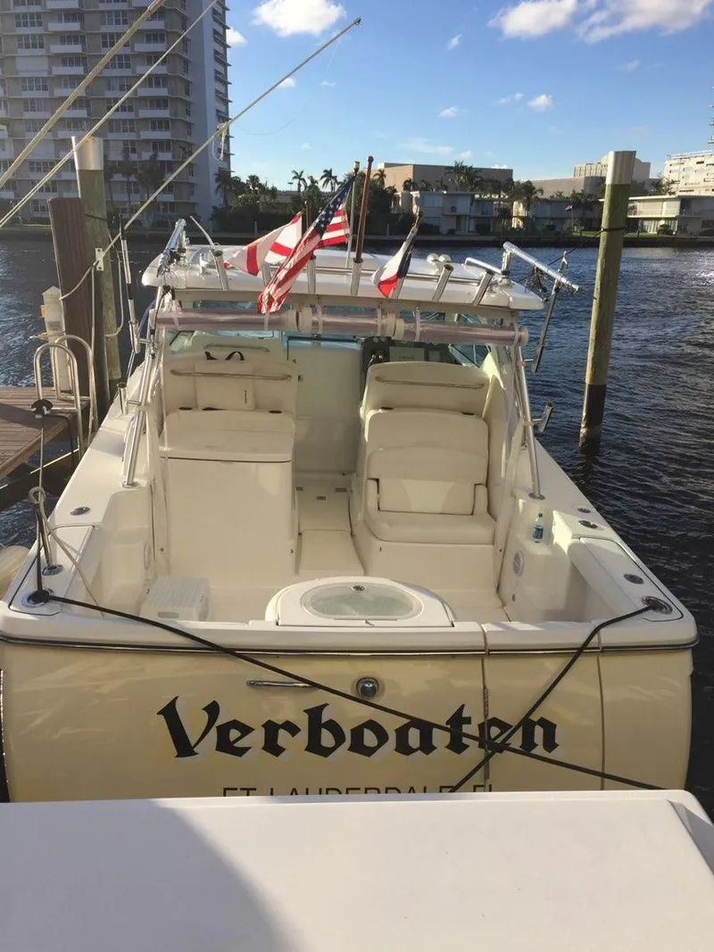 Slide: The Image of 2007 Tiara Yachts 3000 Open swim platform on water. - 12