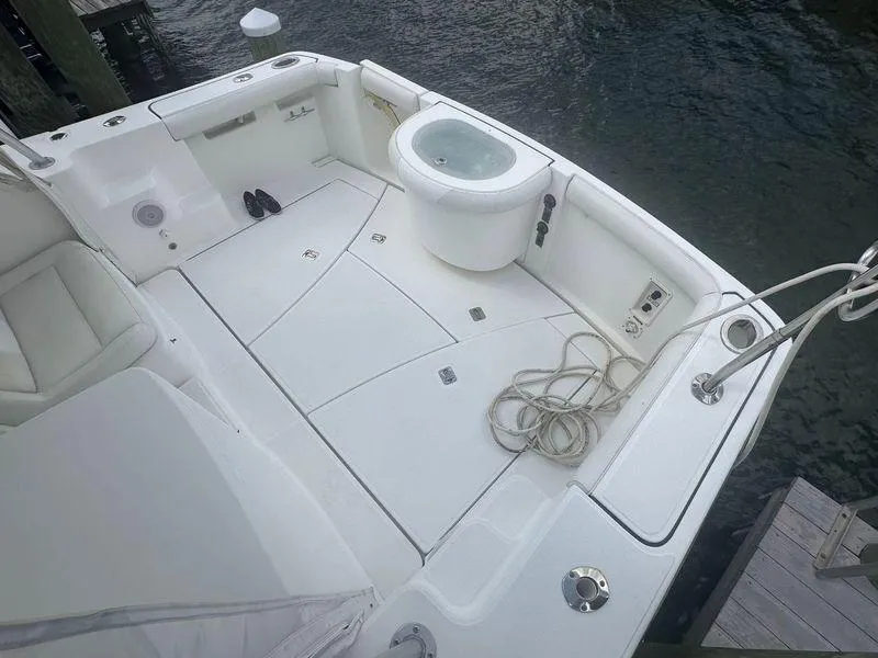 Slide: The Image of 2007 Tiara Yachts 3000 Open interior with seating and control panel. - 25