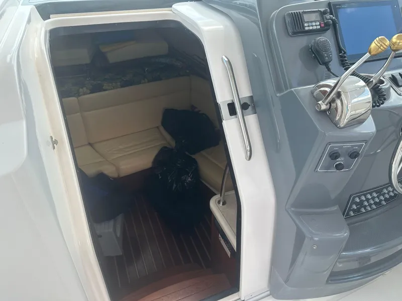 Slide: The Image of 2007 Tiara Yachts 3000 Open bathroom with sink, toilet, and mirror. - 31