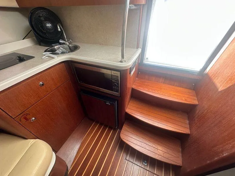 Slide: The Image of 2007 Tiara Yachts 3000 Open water inlet panel with fresh and raw water options. - 32