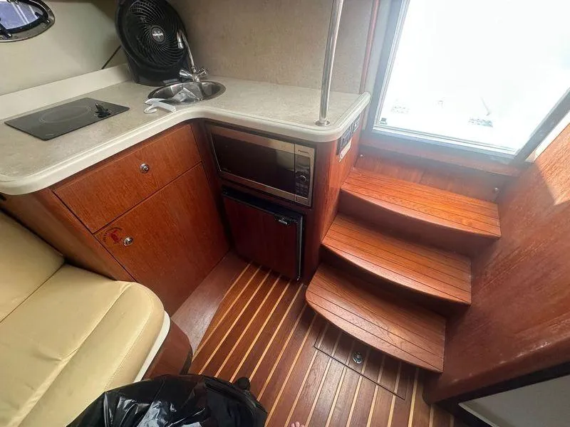 Slide: The Image of Control panel on 2007 Tiara Yachts 3000 Open, featuring shore power and water switches. - 33