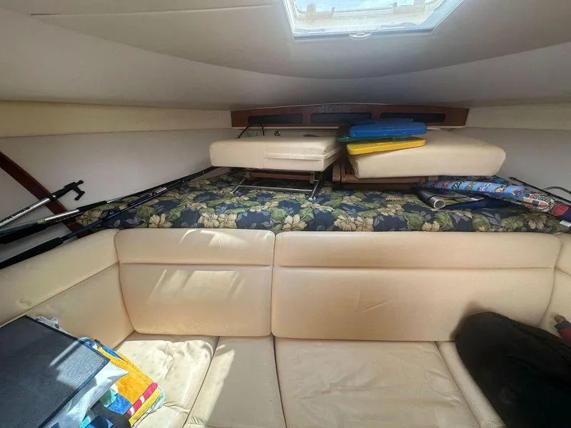 Slide: The Image of Engine compartment of a 2007 Tiara Yachts 3000 Open, showcasing mechanical components and systems. - 36